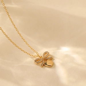 18K gold plated necklace with zircon bow and heart pendant on delicate O-chain link