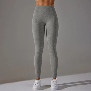 Close-up of high-waist grey marl yoga pants with vertical slimming stitch details