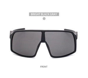 Front view of sporty bright black sunglasses with integrated large gray shield lenses