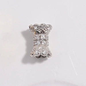 Macro shot of silver S925 necklace clasp with cubic zirconia and screw-lock mechanism