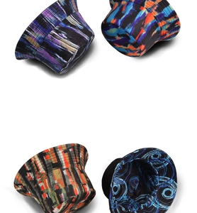 Detailed grid showing four colorful abstract art patterns on reversible bucket hats