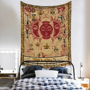 Detail of The World tarot tapestry fabric showing sun, moon, and skull occult motifs