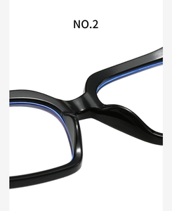 Detail of glossy black spectacle bridge and nose pads on premium anti-blue light glasses