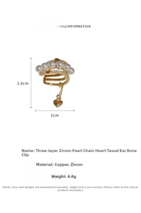Detailed view of triple-layered gold-plated ear cuff with pearls, zircon, and heart tassel