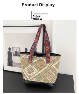 Detail of ethnic geometric woven canvas tote bag with black faux leather base and straps
