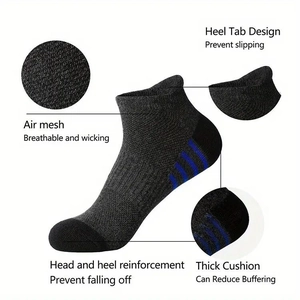 Detail view of breathable mesh and cushioned sole on grey athletic low-cut socks