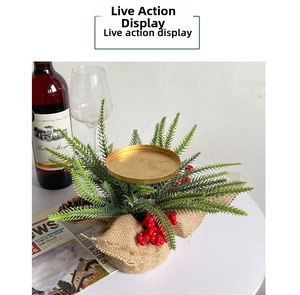 Close-up of a Christmas candle holder with pine needles, red berries, and a burlap base