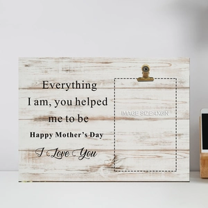 Close-up of wooden Mother's Day photo frame with metal clip and 4x6in size label