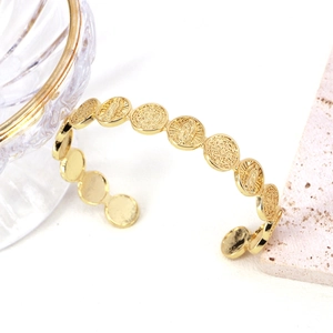 Retro adjustable gold plated brass cuff bracelet featuring religious coin medallions