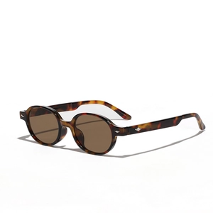 Retro round tortoiseshell sunglasses with brown lenses in a 45-degree angle studio shot