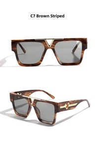 Detail of square tea stripe sunglasses with gold V-bridge and heart logo on temples
