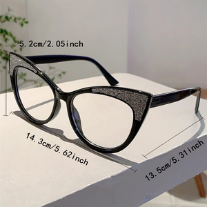 Detail view of black cat-eye glasses with silver glitter accents and size measurements