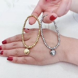 18K gold and silver stainless steel beaded bracelets with textured heart pendants