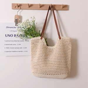 Hollow out cotton woven shoulder bag with brown PU straps for beach vacation