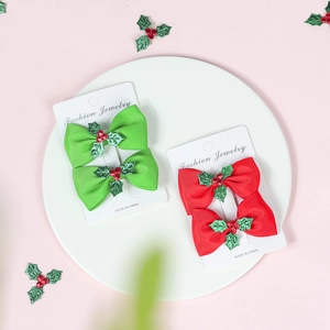 Christmas bow hair clips set with holly berry decor in red and green festive colors