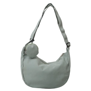 Minimalist mint green nylon half-moon crossbody bag with adjustable strap and small pouch