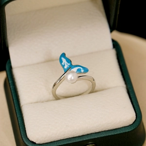 Adjustable silver ring with natural freshwater pearl and blue enamel fishtail design