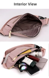 Detail view of purple nylon waist bag interior showing spacious main pocket and storage capacity