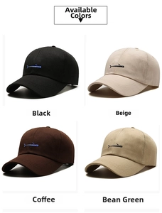Detail showing four available colors of cotton baseball caps with fish embroidery