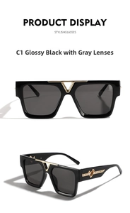 Detail view of glossy black square sunglasses with V-shape bridge and heart temples