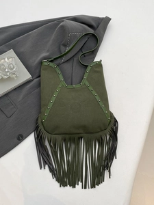 Vintage green suede shoulder bag featuring long fringe tassels and sun face embossing