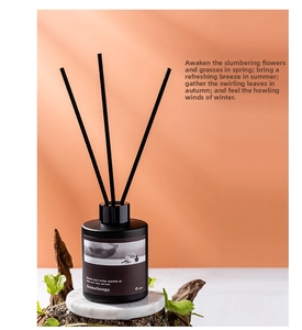 Detailed shot of 120ml black matte reed diffuser set with fiber sticks on marble base