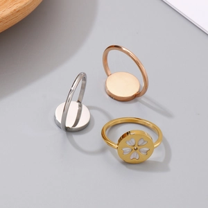 Three-piece stainless steel ring set with white shell cherry blossom and zircon accents