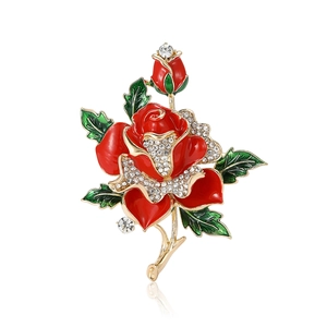Elegant red enamel rose brooch with gold metal leaf and sparkling rhinestones