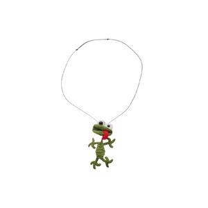 Handmade crochet frog pendant necklace with long tongue on white background