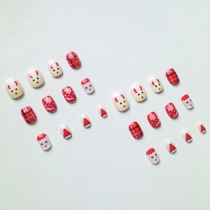 24pcs short round Christmas press-on nails with Santa Claus and reindeer designs