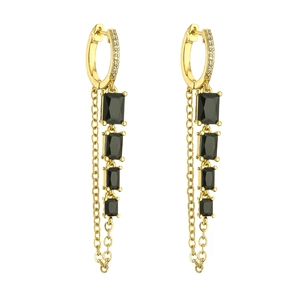 Luxurious gold drop earrings with black rectangular cubic zirconia and long chain tassels