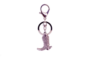 Detailed close-up of a silver rhinestone boot keychain with lobster clasp and ring