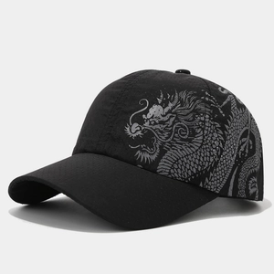 Close-up of black breathable mesh baseball cap with detailed grey dragon print on side