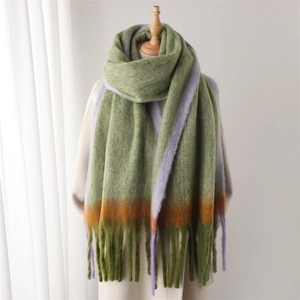 Faux cashmere gradient scarf with tassels in green, purple, and orange shown on a mannequin