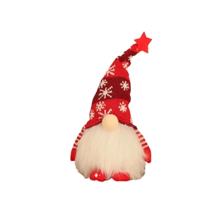 Lighted Christmas gnome plush with red snowflake hat and warm glowing body decoration