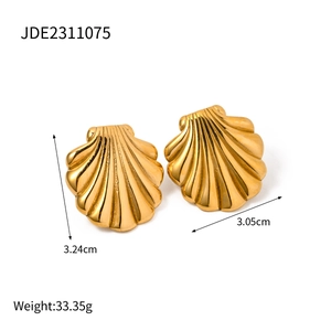 Detailed view of gold shell earrings with dimensions 3.24cm height and 3.05cm width
