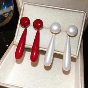 Elegant 18k gold plated long teardrop pearl drop earrings in red and white colors