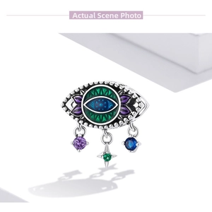 Macro view of S925 silver Evil Eye charm with enamel details and colorful zircon pendants