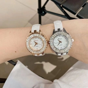 Women's quartz watches with white ceramic bands and diamond-studded bezels in rose gold and silver