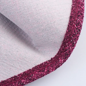 Macro shot of elegant tweed fabric edge with vintage dark burgundy braided trim details