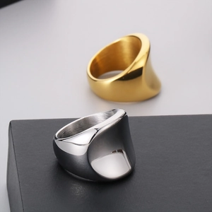 Minimalist wide band stainless steel rings in gold and silver finish with sleek geometric design