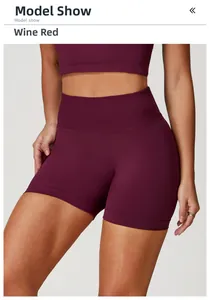 Detail view of wine red high-waist seamless yoga shorts with ribbed waistband