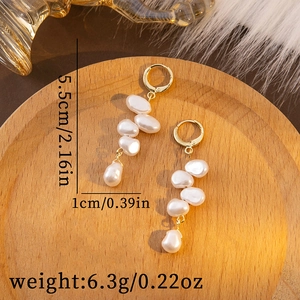 Detailed view of French vintage baroque pearl drop earrings with 5.5cm size measurements