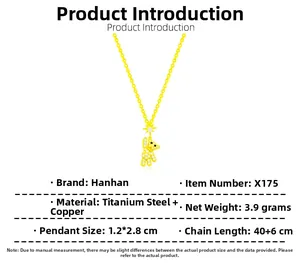 Detail of bear pendant with white crystals and star, titanium steel gold necklace