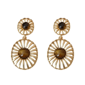 Vintage gold hollow round earrings with tiger eye stone in retro radiant sunburst design