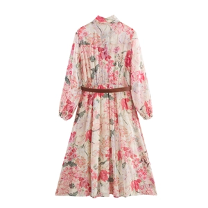 Floral chiffon midi dress with shirt collar and thin brown belt on white background
