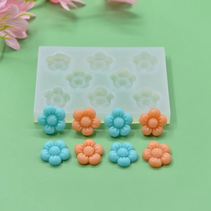 Silicone flower mold for DIY resin crafts featuring nine petal plum blossom shapes