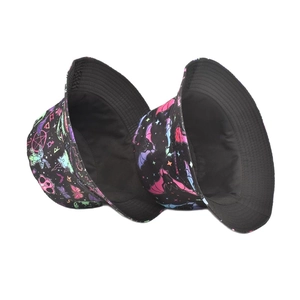 Creative reversible bucket hat with colorful bat and star patterns on black fabric