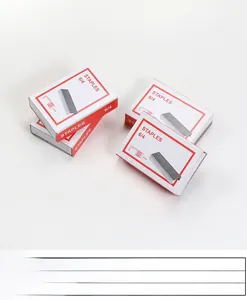 Macro shot of box showing silver 6/4 metal staples with 4mm length for office binding