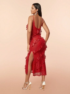 Elegant red sequin evening dress with spaghetti straps, backless design, and high slit